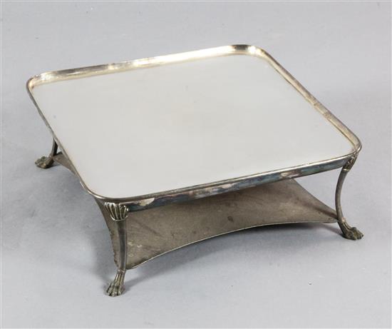 A silver plated and steel warming stand 18.5in.